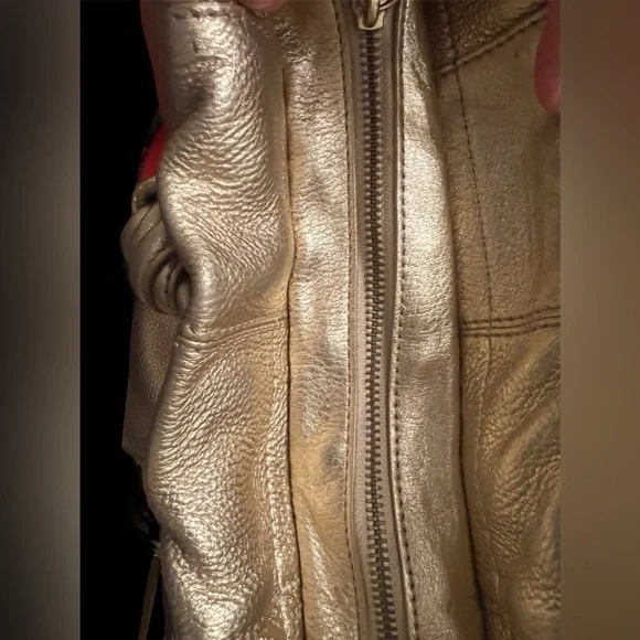 Michael Kors Metallic Gold Leather Drawstring Shoulder Bag. - Picture 7 of 16